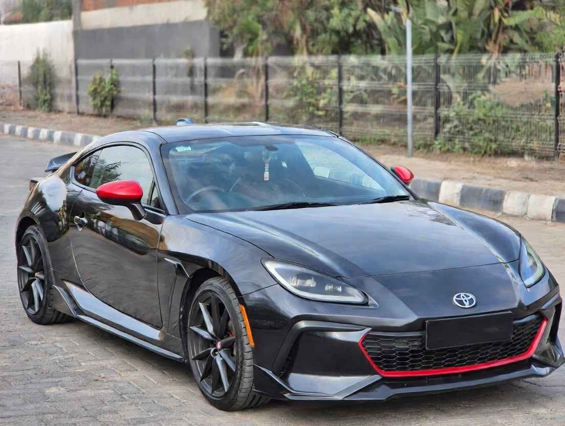 "Black Toyota GR86 coupe with red accents – best value for money sports car in 2026, perfect for beginners and track days with excellent handling and price"