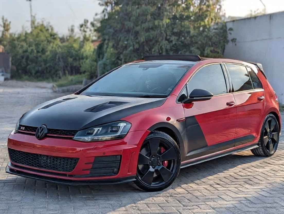 Red Volkswagen Golf GTI hot hatch legend 2026 – iconic performance hatchback in the USA, parked outdoors